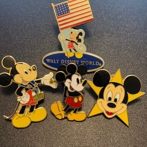 Four Mickey Mouse Disney trading pins